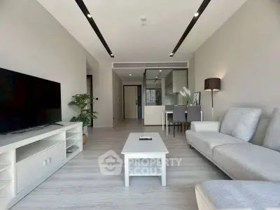 Modern living room with sleek furniture and open layout, perfect for contemporary living.