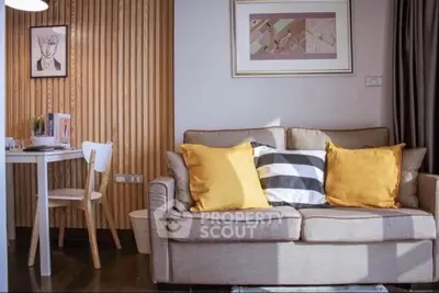 Chic living room with cozy sofa and stylish decor in modern apartment