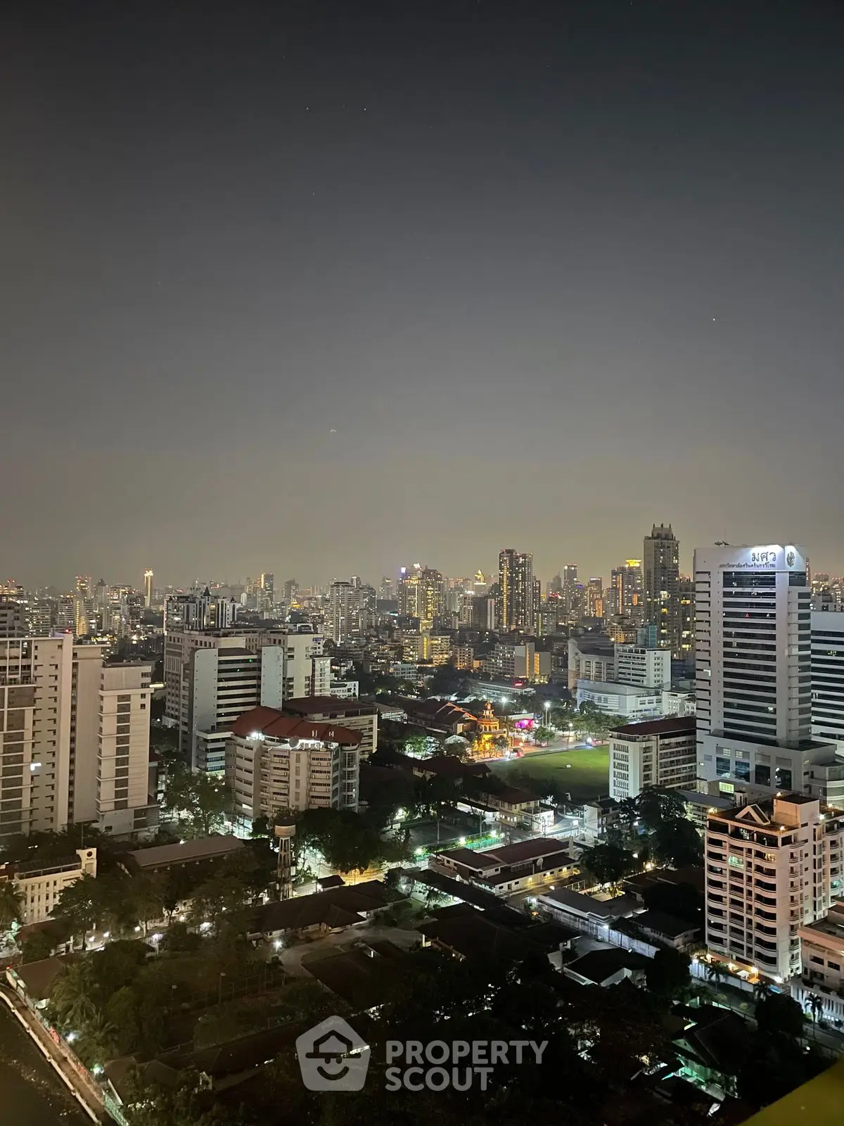 Stunning cityscape view showcasing a vibrant urban skyline at night.
