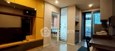 Modern apartment interior with open layout and balcony view