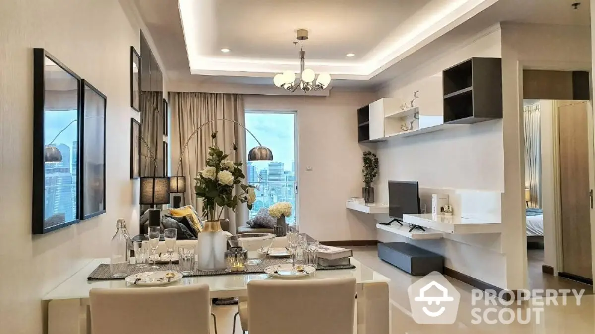 Elegant modern living room with dining area and city view, featuring stylish decor and ample natural light.