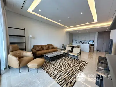 Luxurious modern living room with open kitchen and stylish furniture