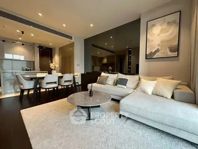 Luxurious modern living room with elegant dining area and stylish decor