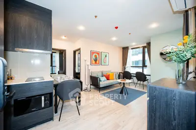 Modern open-plan living room with stylish kitchen and cozy seating area