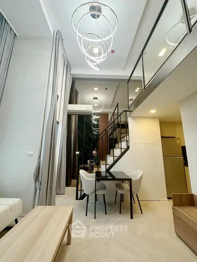 Modern duplex apartment with stylish lighting and open living space