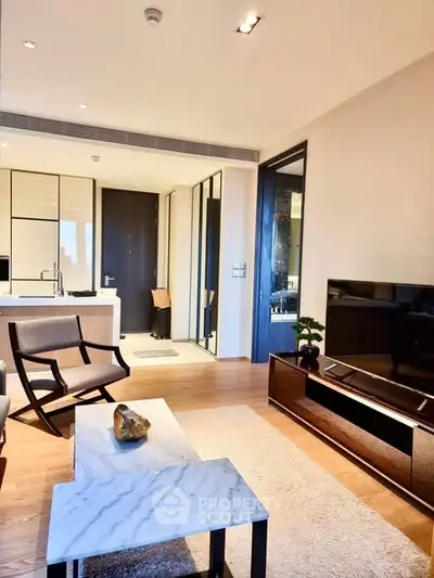 Modern living room with stylish furniture and open kitchen layout