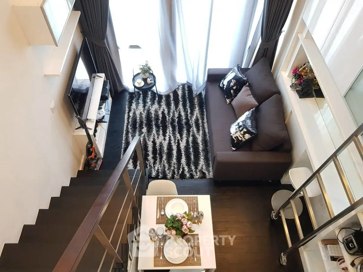 Stylish loft living room with modern decor and cozy ambiance