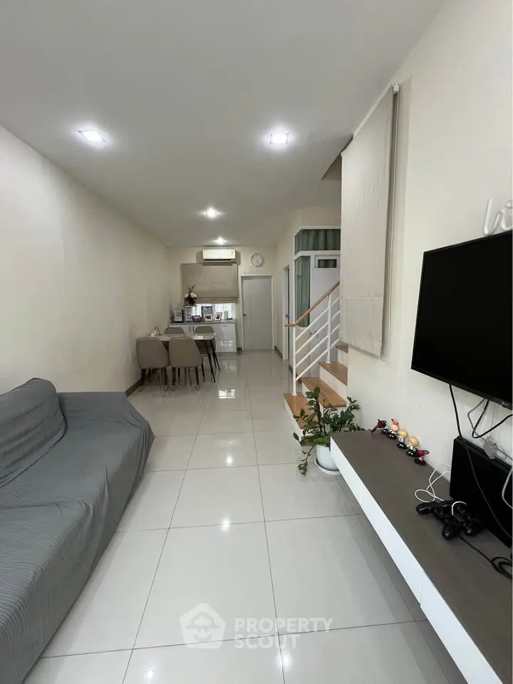 Modern living room with sleek design, open layout, and stylish decor.