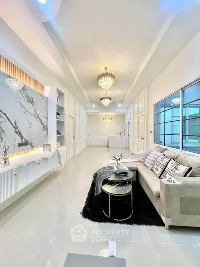 Luxurious modern living room with elegant decor and marble accents