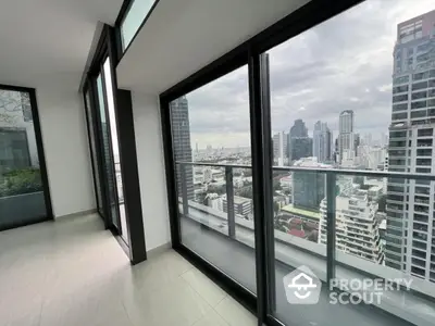 Stunning city view from modern high-rise apartment balcony