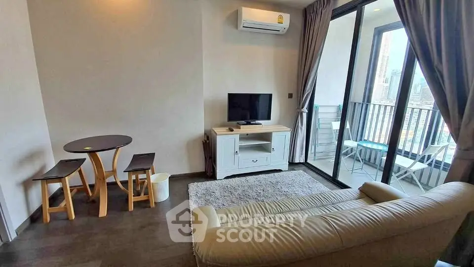 Modern living room with balcony view in urban apartment