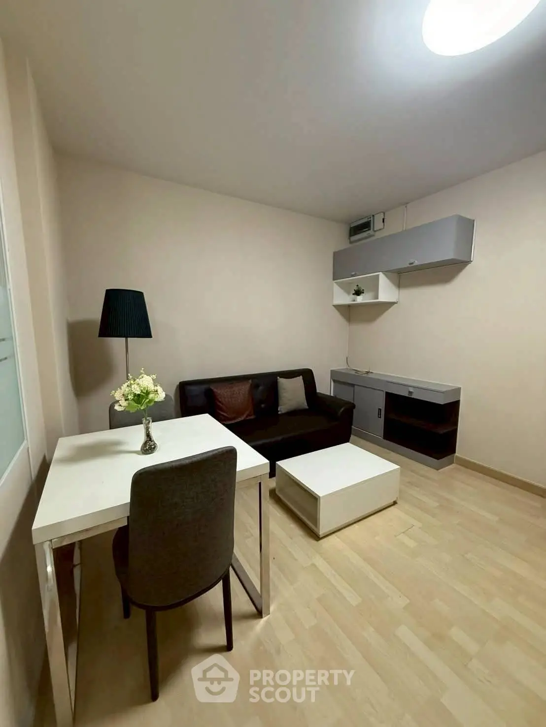 Cozy living room with modern furniture and stylish decor, perfect for relaxation and entertaining.