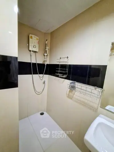 Modern bathroom with shower and sleek tile design