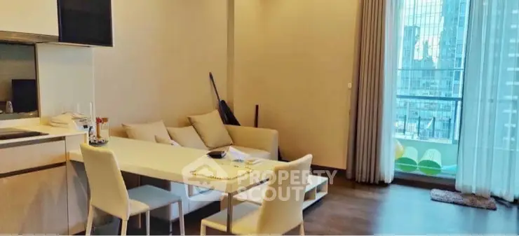 Modern living room with dining area and city view from large windows.