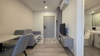 Modern living room with sleek furniture and open layout