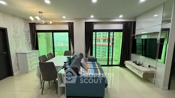 Spacious modern living room with elegant decor and city view