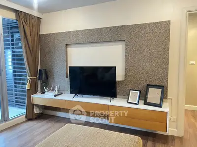 Modern living room with stylish TV unit and elegant decor