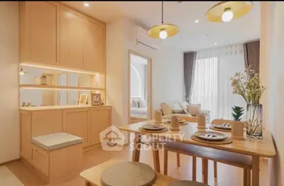 Charming open-plan dining area with natural wood finishes and cozy lighting in modern apartment.
