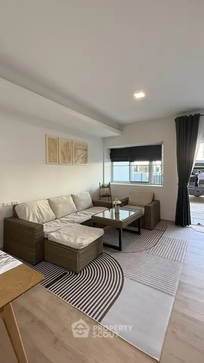 Modern living room with stylish furniture and natural light