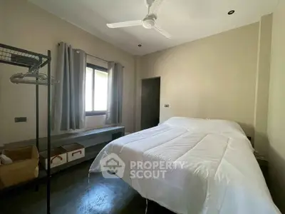 Cozy bedroom with modern decor and natural light
