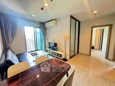 Modern living room with balcony in high-rise apartment