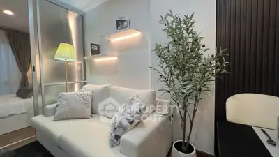 Stylish modern living room with cozy sofa and elegant decor