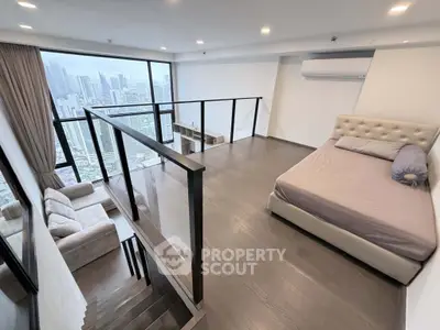 Luxurious loft bedroom with stunning city view and modern furnishings