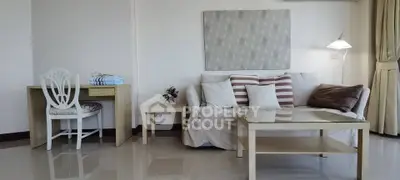 Chic living room with modern furniture and elegant decor in a bright apartment.