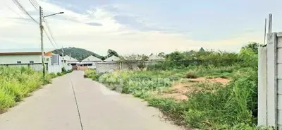 Spacious plot of land in serene residential area with scenic views, perfect for building your dream home.