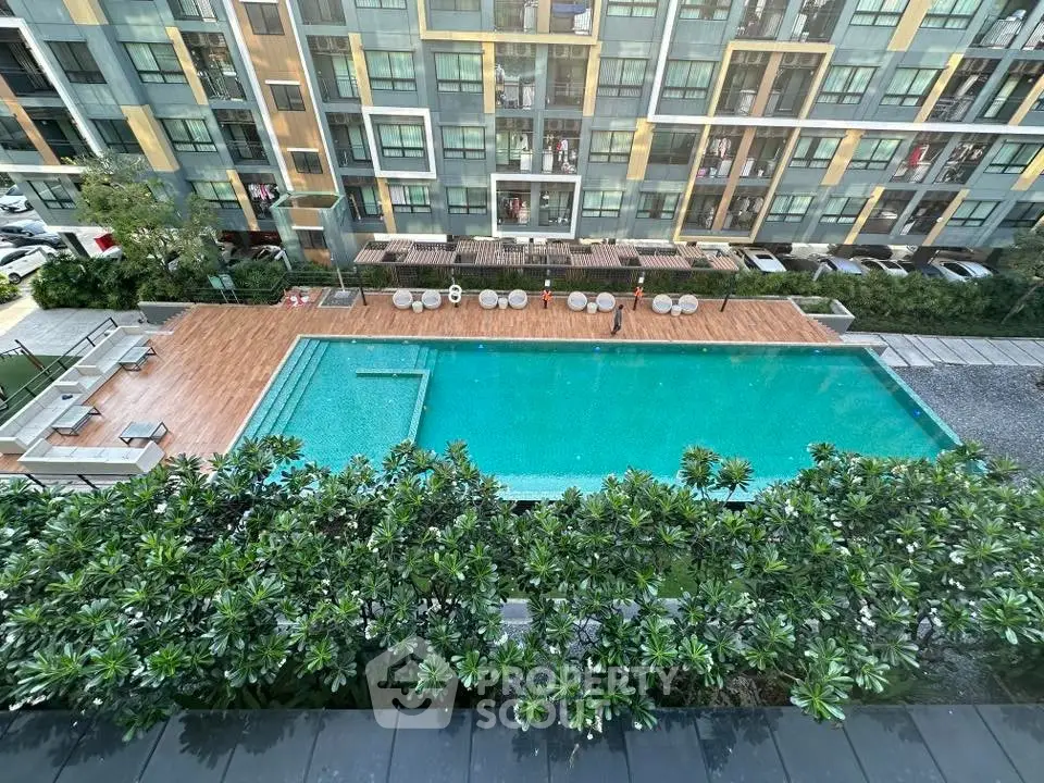 Luxurious apartment complex with stunning pool and modern design