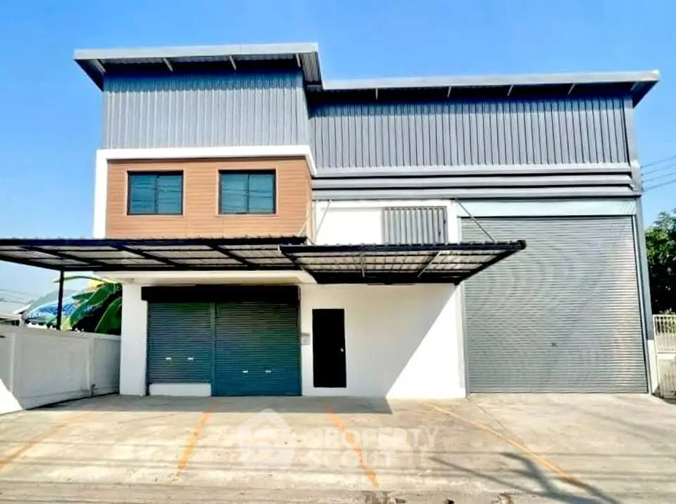 Modern industrial warehouse with spacious parking and sleek design