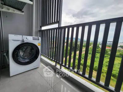 Modern balcony with washing machine and scenic view