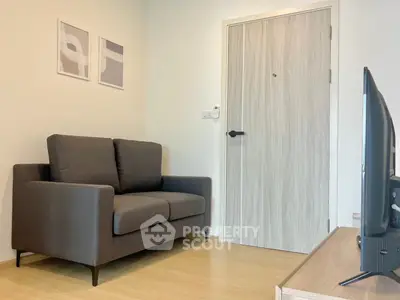 Modern living room with cozy sofa and minimalist decor