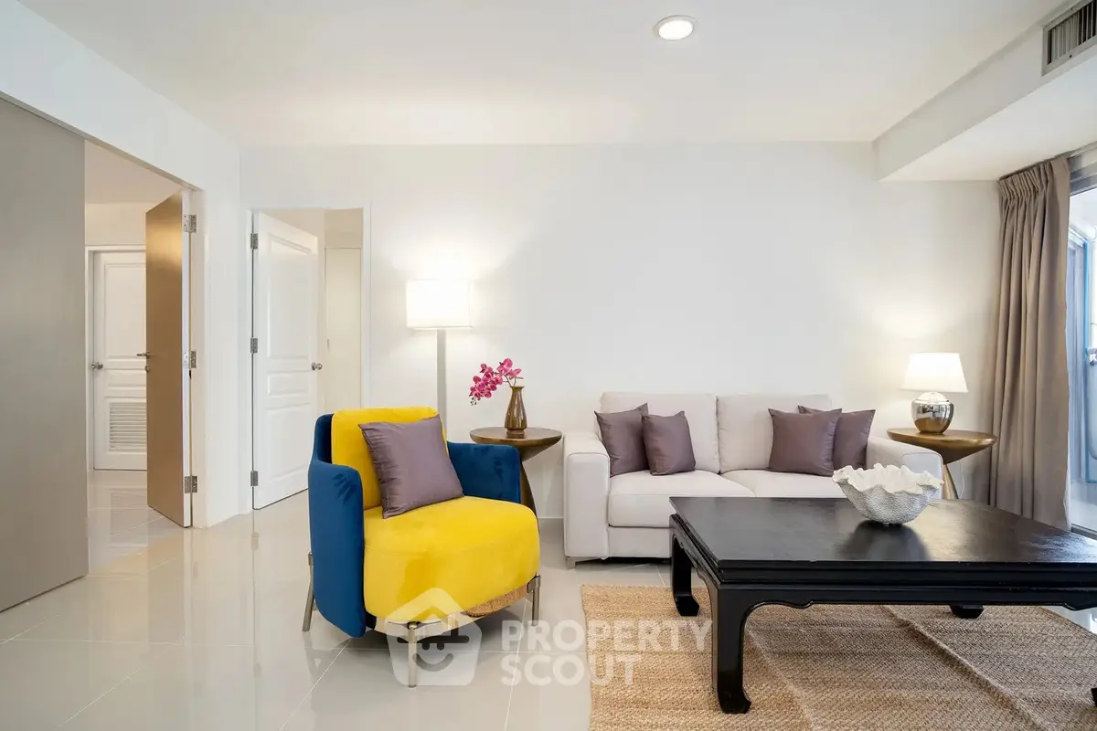 Modern living room with stylish furniture and bright decor in a cozy apartment.
