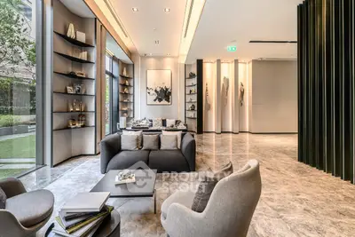 Luxurious modern living room with elegant decor and floor-to-ceiling windows.