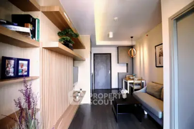 Modern living room with stylish decor and cozy seating area in a contemporary apartment.