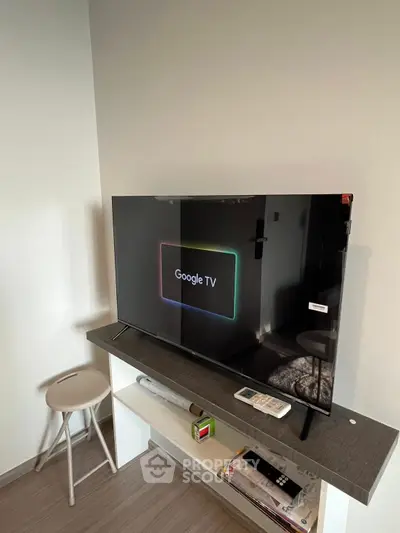 Modern living room with sleek TV setup and minimalist decor