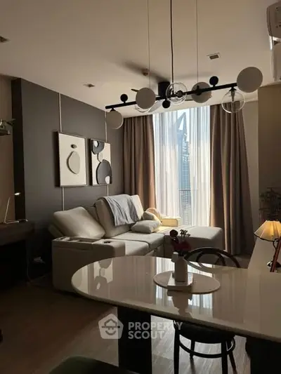 Modern living room with stylish lighting and cozy seating area