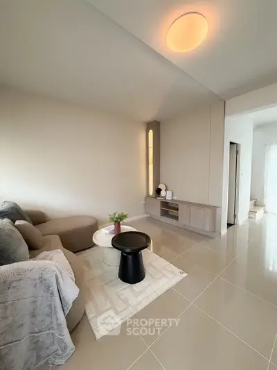 Modern living room with sleek furniture and elegant decor