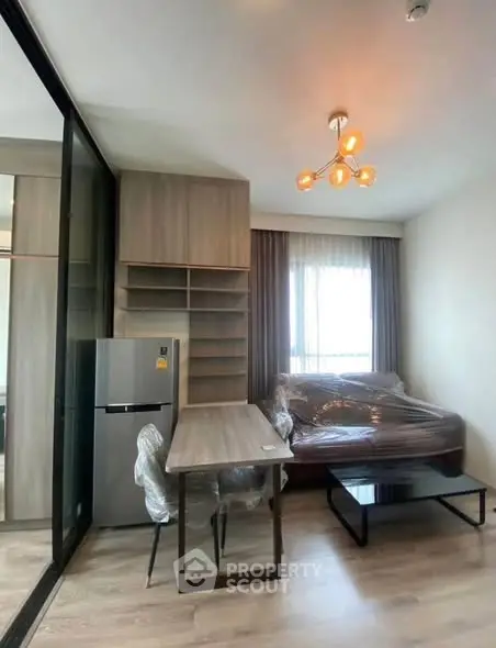 Modern studio apartment with stylish furniture and natural light