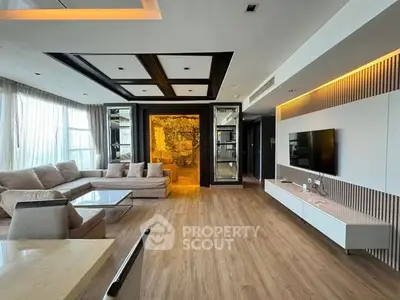 Luxurious modern living room with elegant decor and spacious seating area