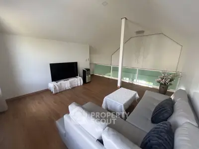 Spacious modern living room with elegant decor and natural light