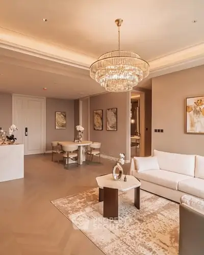 Luxurious living room with elegant chandelier and modern decor