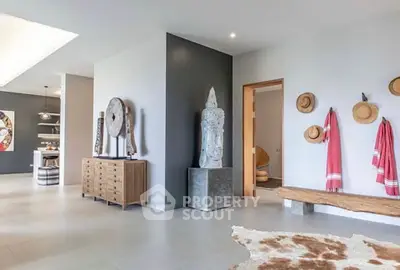 Spacious modern living room with unique decor and natural light