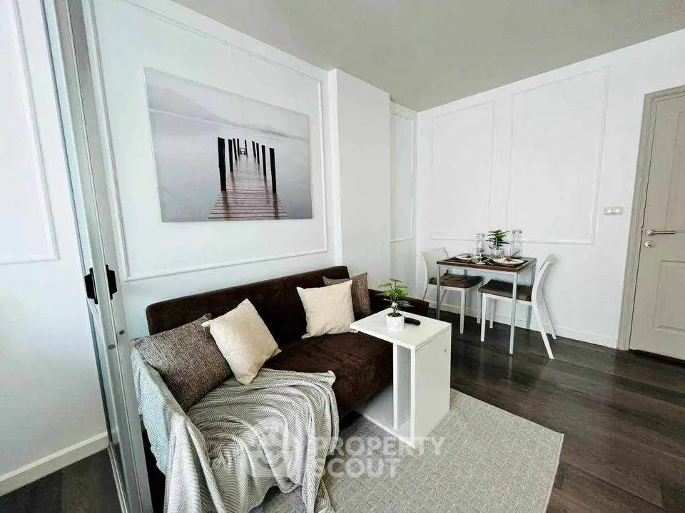 Modern living room with stylish decor and cozy seating area