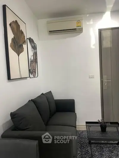 Cozy living room with modern decor and air conditioning