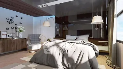 Luxurious modern bedroom with stylish decor and ample natural light