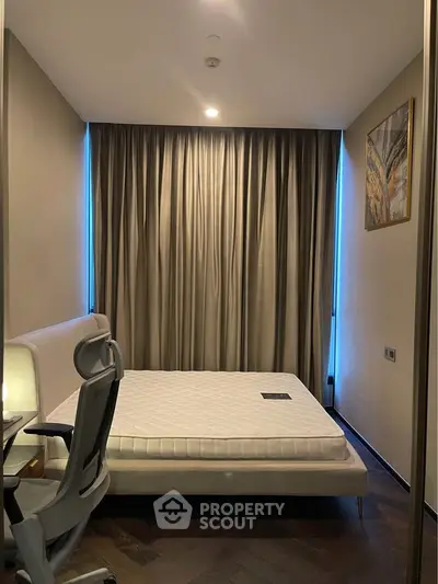 Modern bedroom with sleek design and comfortable mattress, perfect for restful nights.