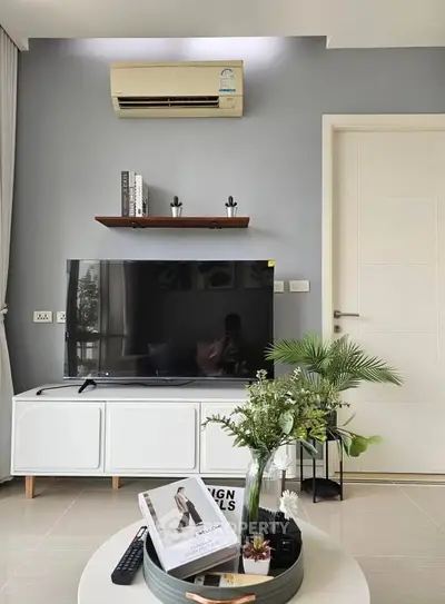 Modern living room with sleek TV setup and stylish decor