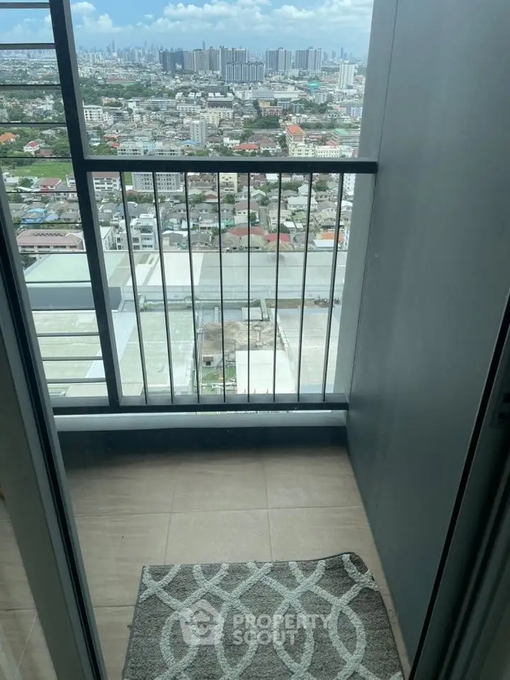 Stunning high-rise balcony with panoramic city views, perfect for urban living enthusiasts.